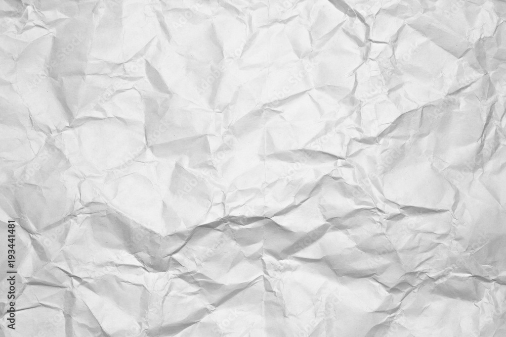 Background of a white crumpled paper. Background of a white crumpled paper.