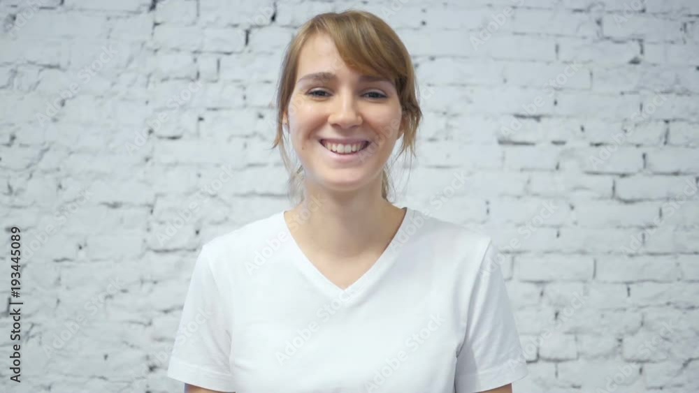 Slow Motion of Smiling Satisfied Young Woman Slow Motion of Smiling Satisfied Young Woman