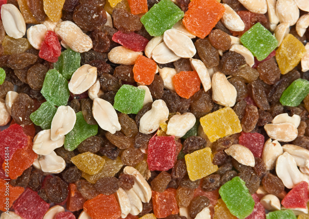A mixture of nuts and dried fruit pieces A mixture of nuts and dried fruit pieces