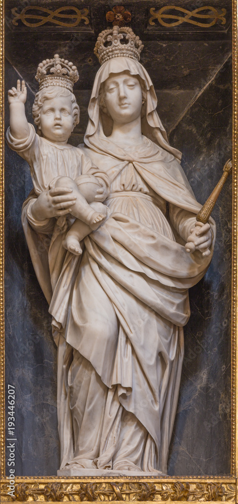 TURIN, ITALY - MARCH 15, 2017: The marble statue of Madonna (Mary Help of Christians) in church Chiesa di San Francesco da Paola by  Tomaso Carlone (1655).