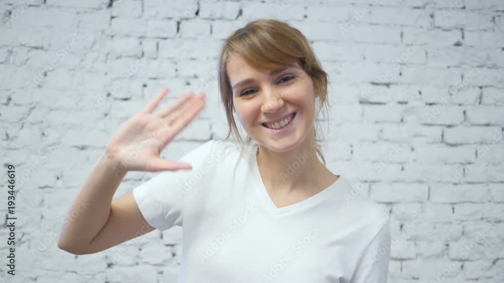 Slow Motion of Hello Gesture by Young Woman Slow Motion of Hello Gesture by Young Woman