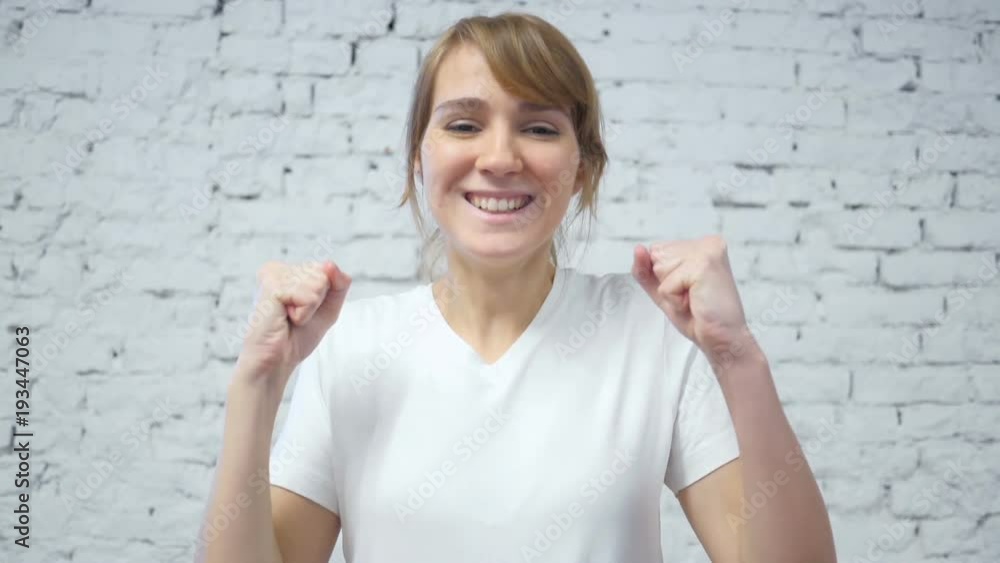 Slow Motion of Excited Young Woman Celebrating Success Slow Motion of Excited Young Woman Celebrating Success