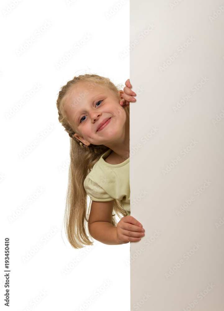 Little girl peeking out from behind banner, isolated on white Little girl peeking out from behind banner, isolated on white