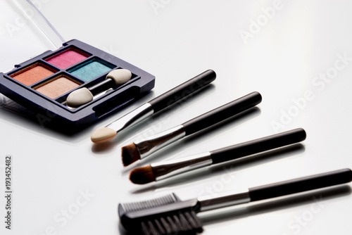 cosmetics on white background top view.