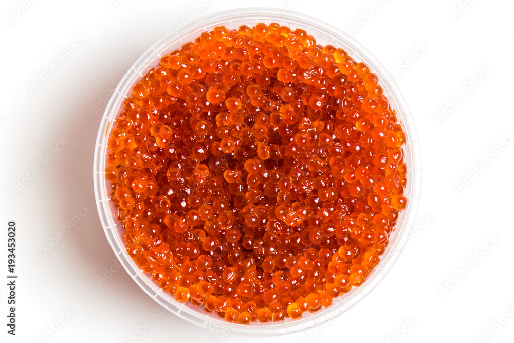 red caviar salmon in a jar on a white background red caviar salmon in a jar on a white background