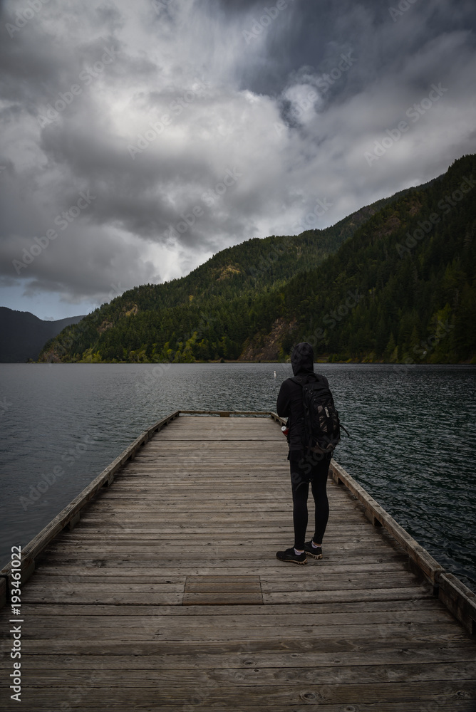 Standing on a dock overlooking Crescent Lake in the Pacific Northwest on an overcast day