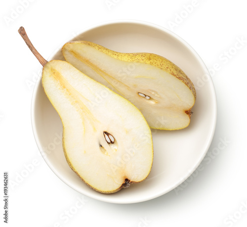Pear in Bowl Isolated on White Background photo