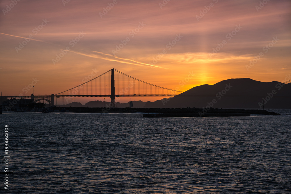Sunset over bridge in San Francisco Sunset over bridge in San Francisco