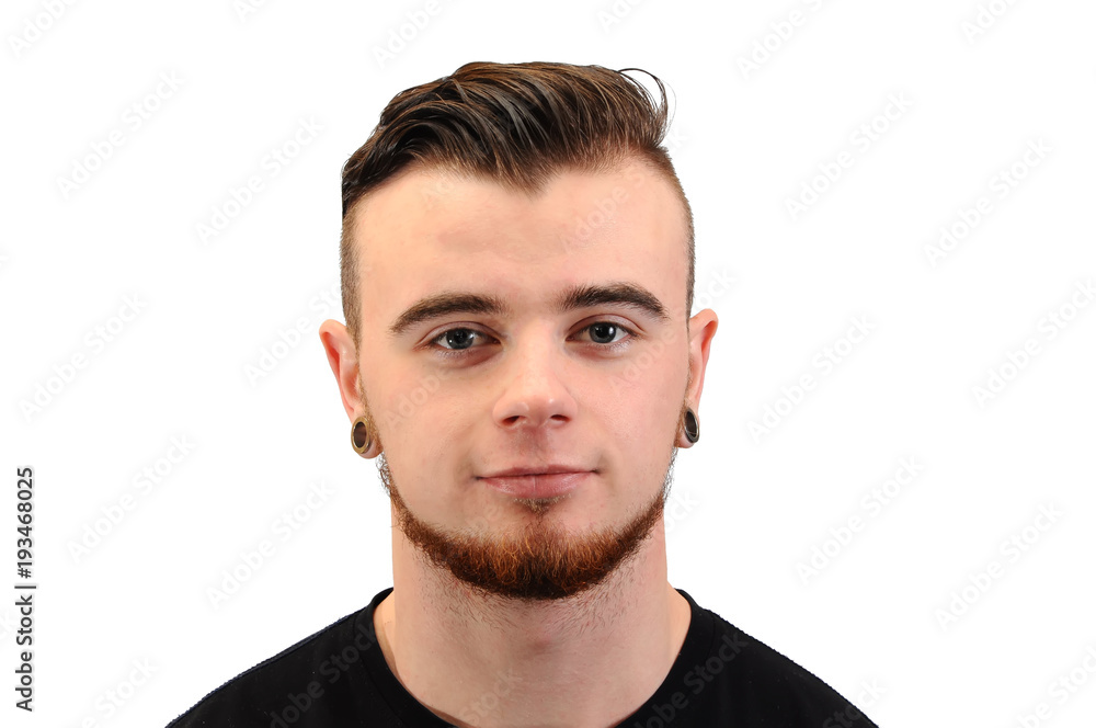 Collage of a handsome young man, with a beard and tunnels in his ears, isolated on white Collage of a handsome young man, with a beard and tunnels in his ears, isolated on white