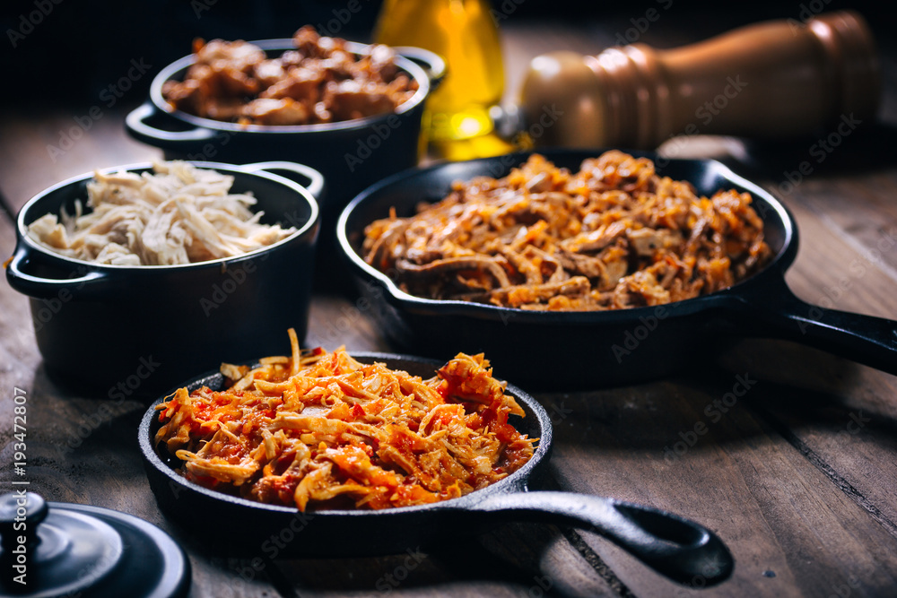 Tasty dishes in frying pans Tasty dishes in frying pans