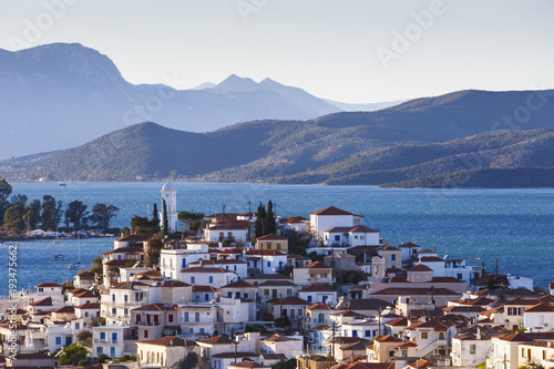 View of Poros island and mountains of Peloponnese peninsula in Greece. 