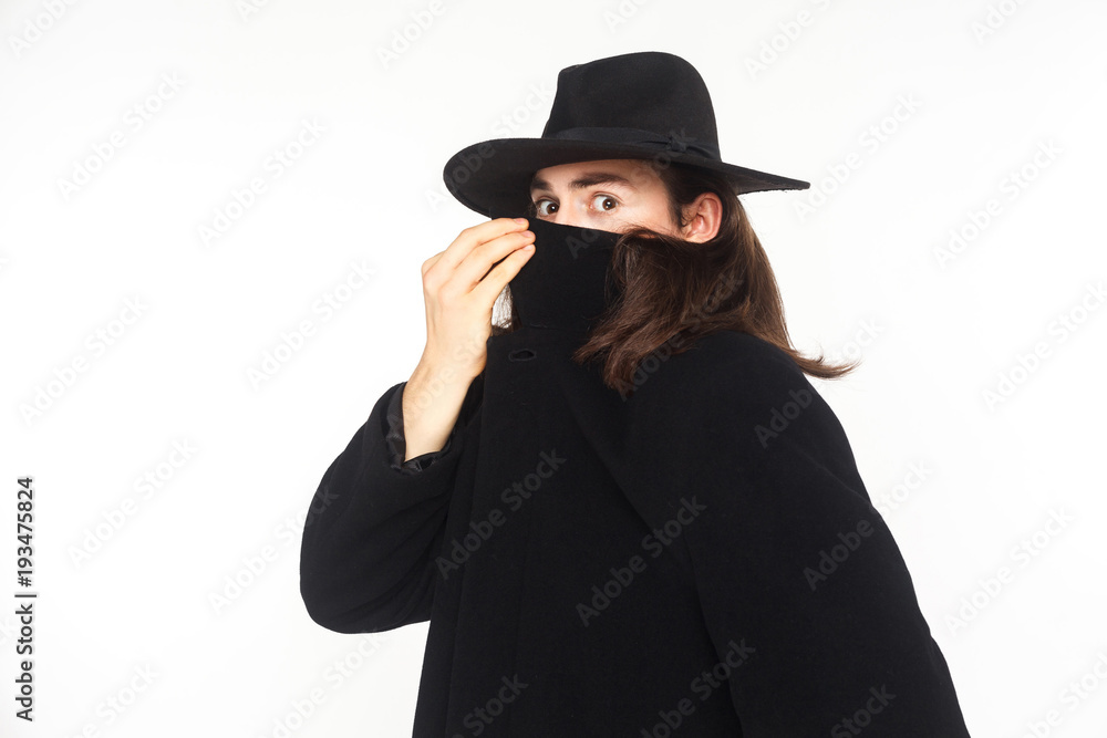 Incognito secrecy agent spy, looking at camera with big eyes Incognito secrecy agent spy, looking at camera with big eyes