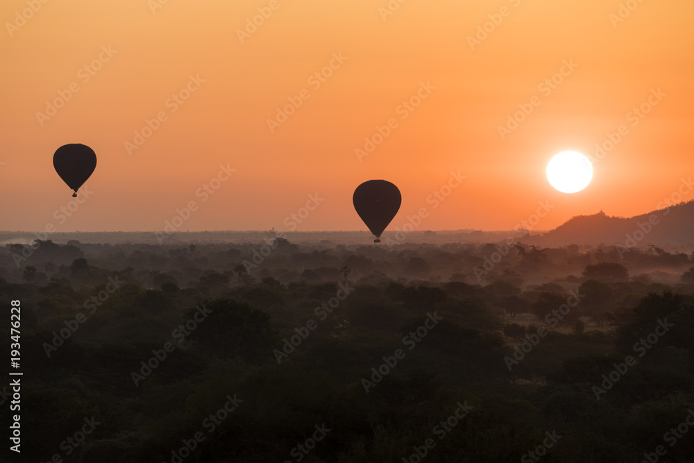Hot air balloons with tourist are ready for fly to enjoy sunrise over Bagan in Myanmar