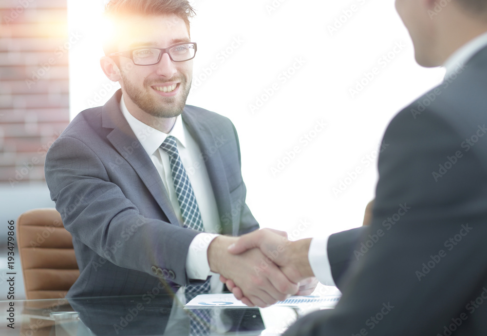 Fototapeta premium welcome and handshake business partners