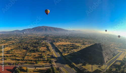 Hot air balloon flying above the Sun Pyramid in Teotihuacan