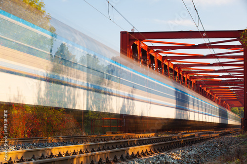 Speed train on the iron railway bridge, Czech Republic