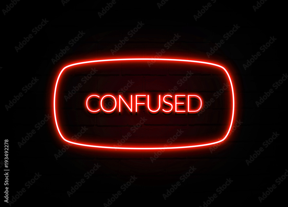 Confused neon sign on brick wall background. Confused neon sign on brick wall background.
