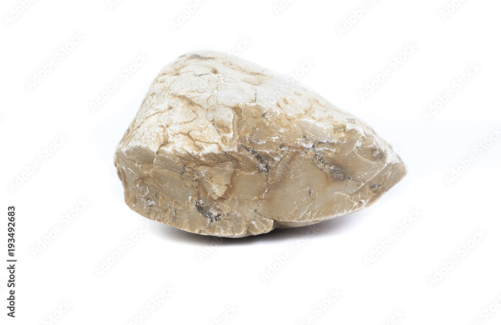 Single natural stone on white background, close-up Single natural stone on white background, close-up