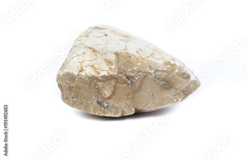 Single natural stone on white background, close-up