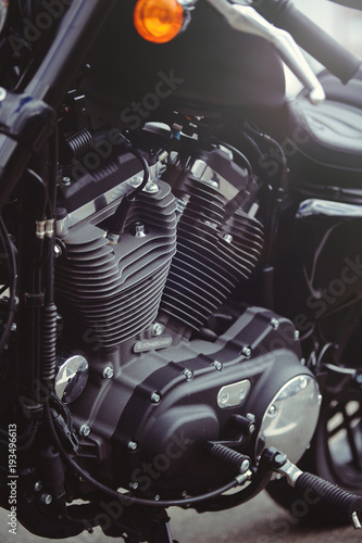 beautiful black motorcycle motor close-up, view of the filter