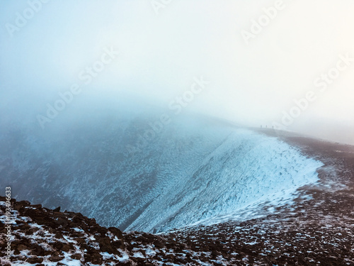 mysterious mountains with people photo