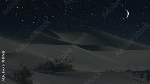 Sand dunes under a crescent moon in a desert night (Loop).