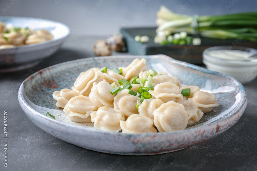 Plate with tasty meat dumplings on table Plate with tasty meat dumplings on table