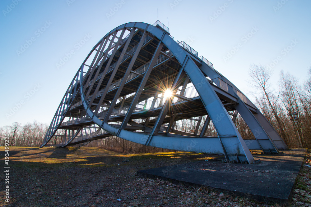 The sun shines through the steel structure of the Bitterfeld arch, a landmark of the East German chemical city.