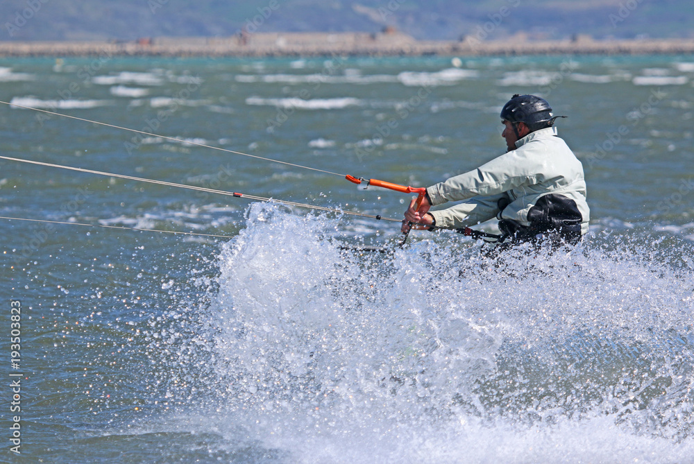 Fototapeta premium kitesurfer in Portland harbour