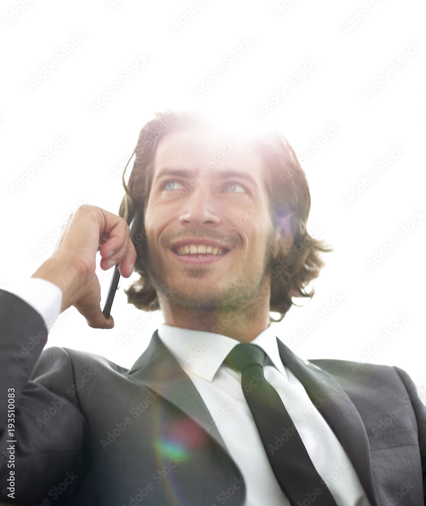 successful business man talking on a smartphone successful business man talking on a smartphone