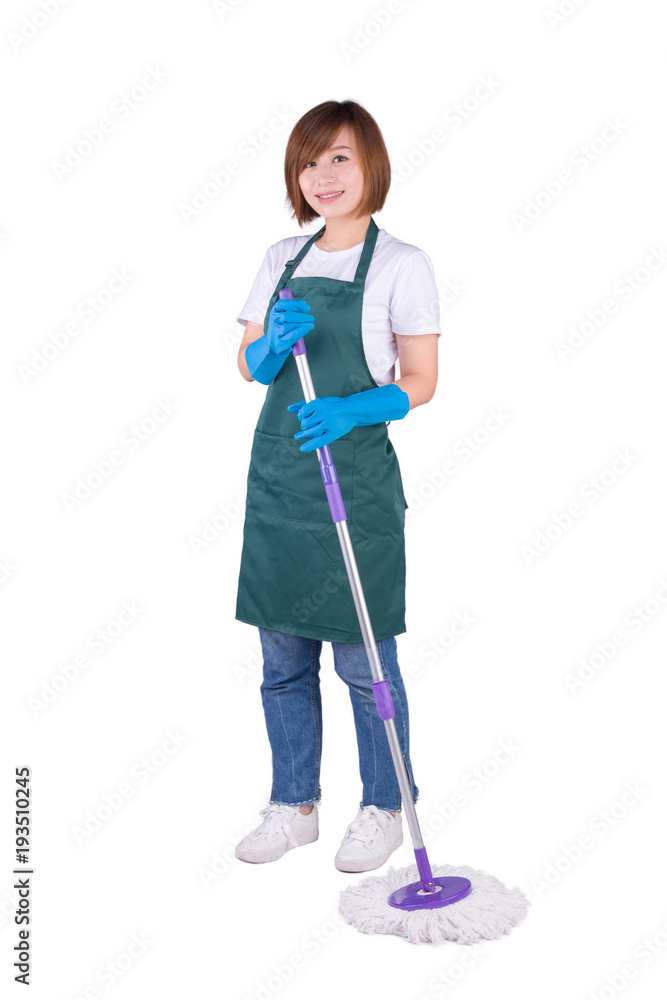 Young Asian housewife holding mop stand on white background Young Asian housewife holding mop stand on white background