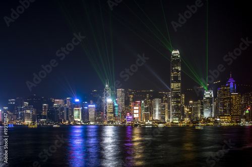 Hong Kong Central Business District at night with laser beam © Earnest Tse