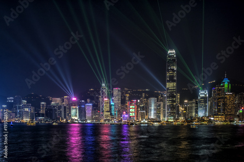 Hong Kong Central Business District at night with laser beam © Earnest Tse