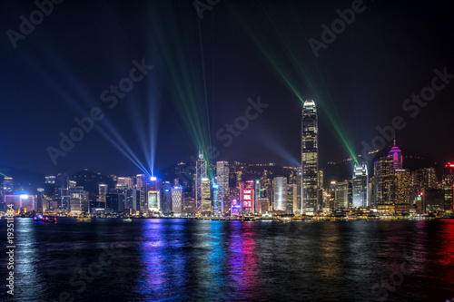 Hong Kong Central Business District at night with laser beam