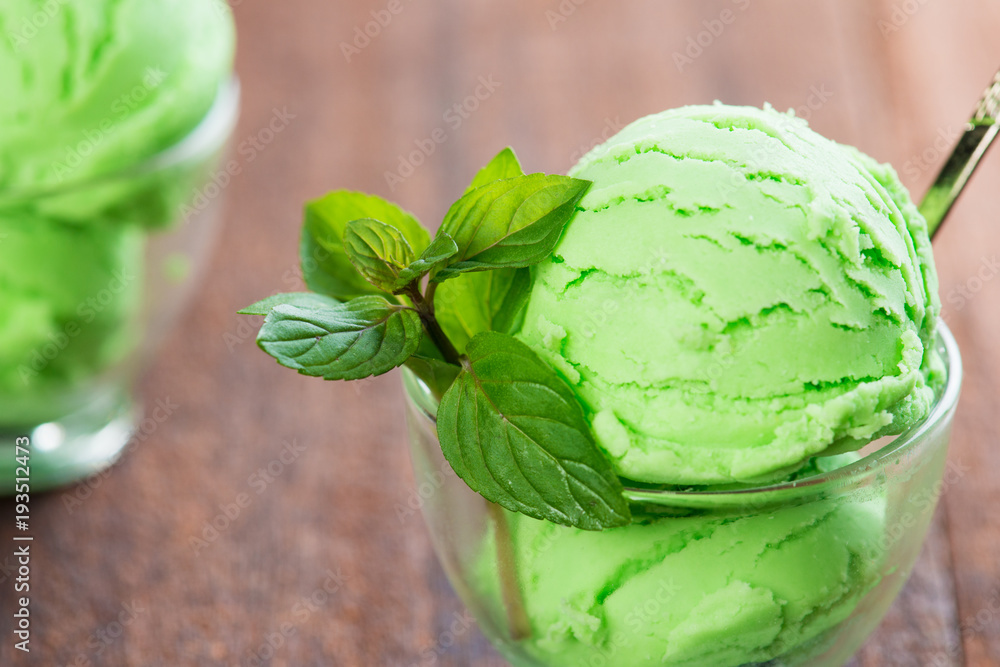 Cup of pistachio ice cream close up