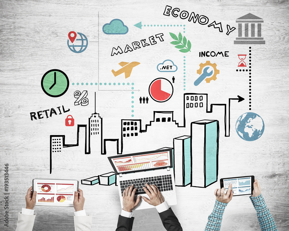 Top view of businesspeople sitting at table and using gadgets