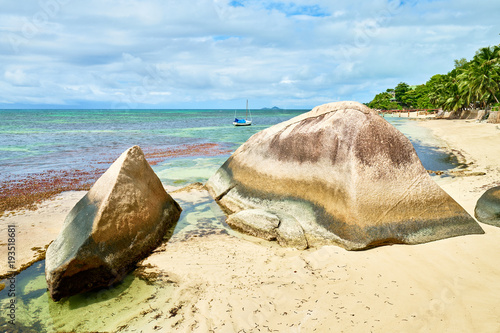 coastline of Praslin, tropical beach with big granite rocks , Anse cimitière, Seychelles