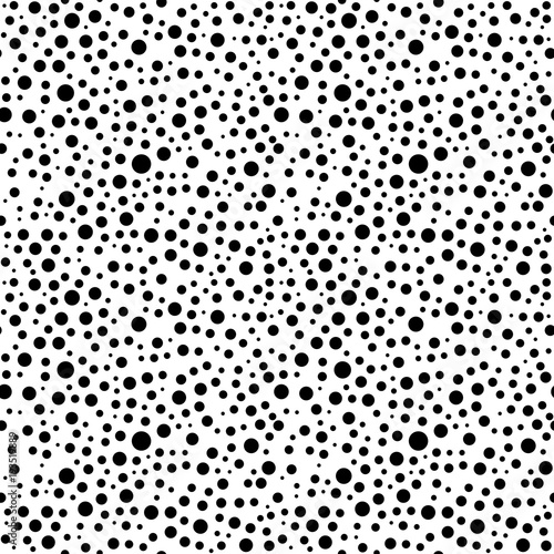 Seamless background with random black circles. Abstract ornament. Dotted abstract pattern