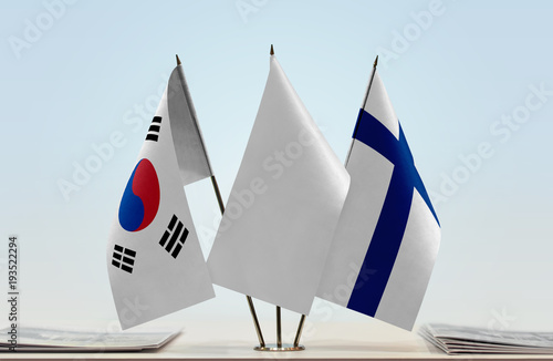 Flags of South Korea and Finland with a white flag in the middle