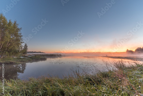 Morning mist on lake Vanaja, Finland