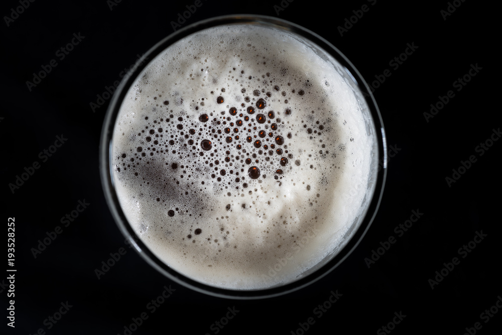 Top view glass of beer, beer foam and bubbles texture Top view glass of beer, beer foam and bubbles texture
