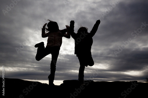 Kids Jumping Silhouette