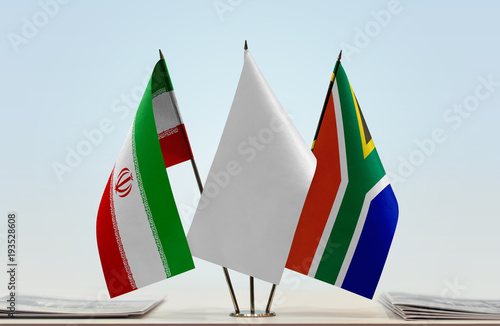 Flags of Iran and Republic of South Africa with a white flag in the middle photo