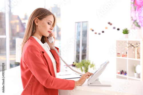 Beauty salon receptionist a...