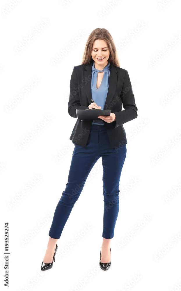 Beautiful young businesswoman in elegant suit and with clipboard on white background Beautiful young businesswoman in elegant suit and with clipboard on white background