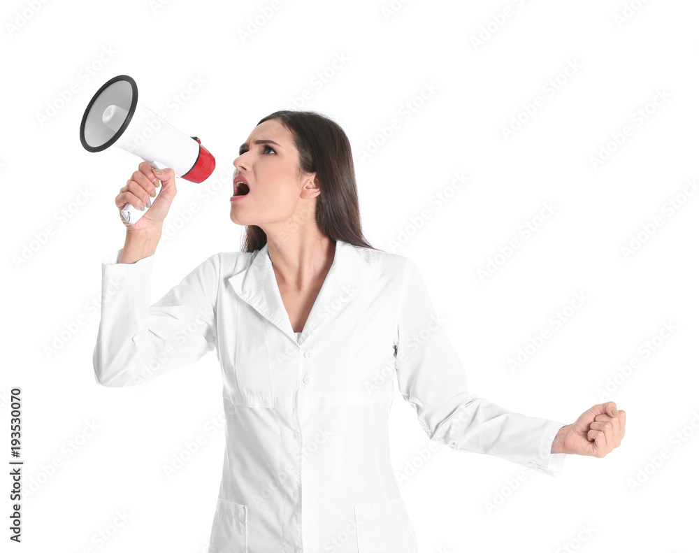 Female doctor with megaphone on white background Female doctor with megaphone on white background