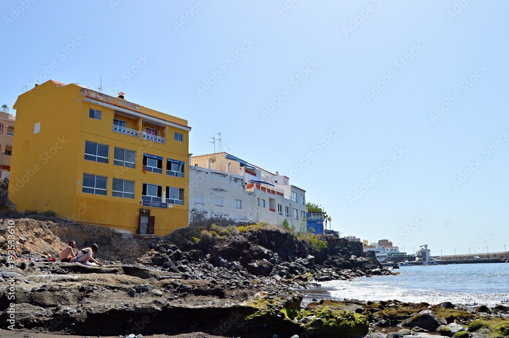 Yellow house on sea shore