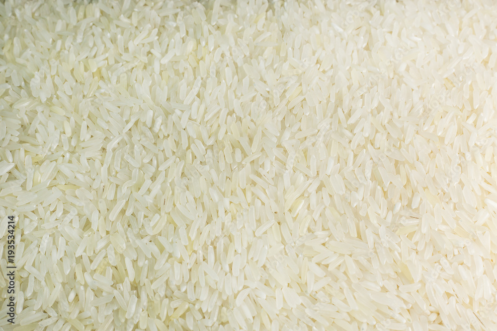 rice grain on wood table image for background. rice grain on wood table image for background.