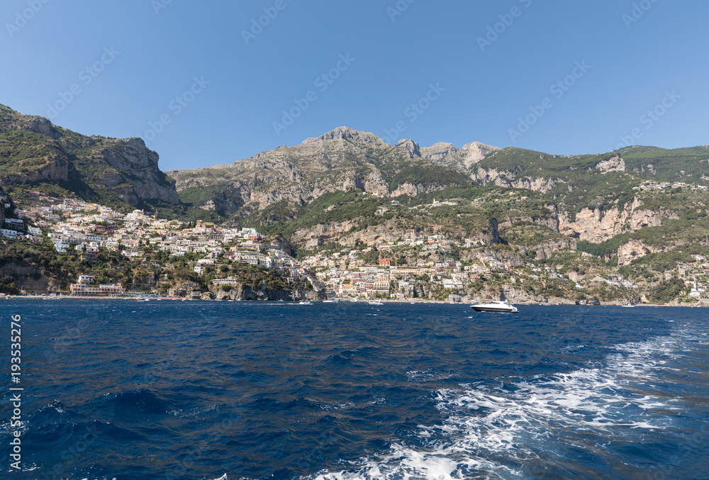 Colourful Positano, the jewel of the Amalfi Coast, with its multicoloured homes and buildings perched on a large hill overlooking the sea. Italy Colourful Positano, the jewel of the Amalfi Coast, with its multicoloured homes and buildings perched on a large hill overlooking the sea. Italy