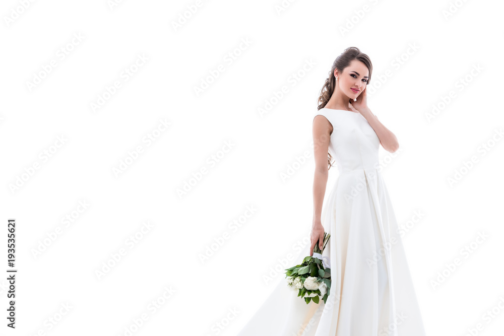 smiling bride posing in traditional white dress with wedding bouquet, isolated on white smiling bride posing in traditional white dress with wedding bouquet, isolated on white